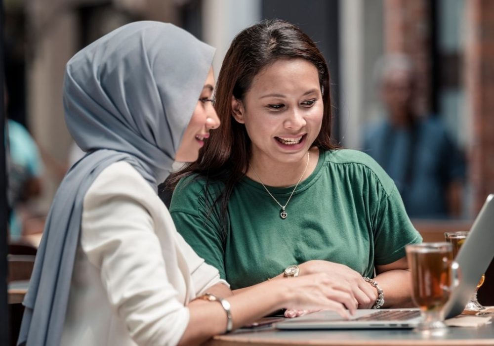 Ladies working on laptop